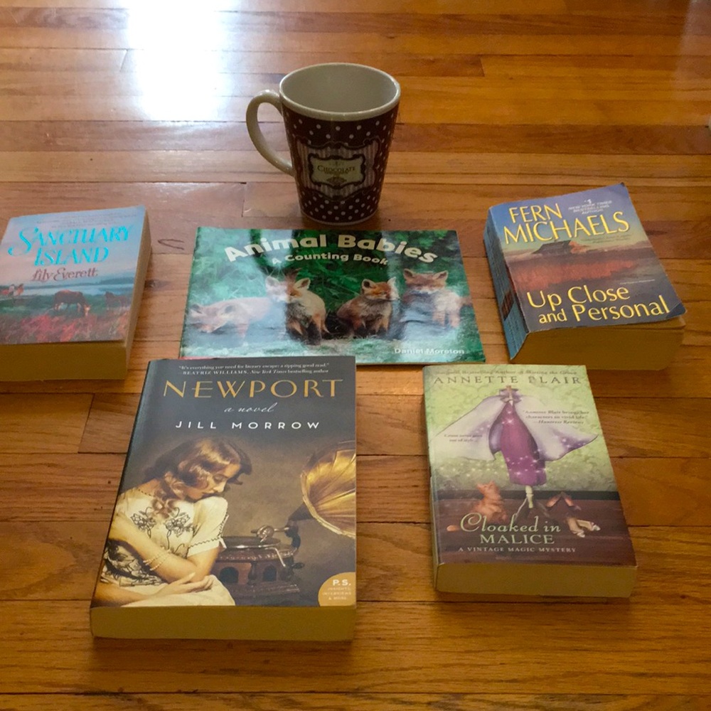 Paperback books - All 5 for one price, and a coffee mug to go with it.